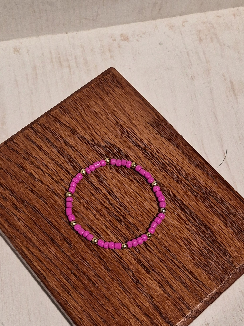 Delicate Hot Pink Beaded Bracelet with Gold Accents